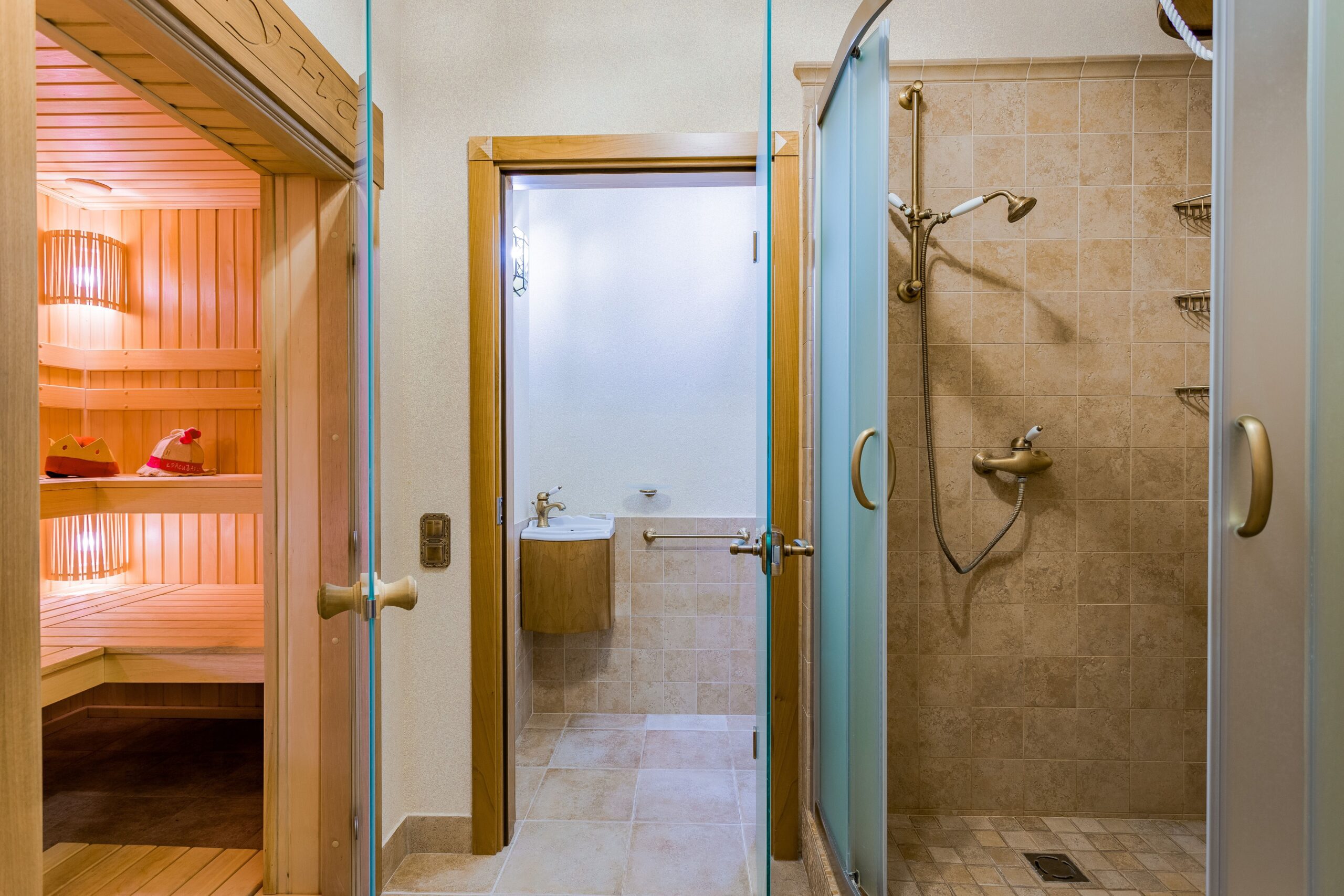 Luxurious spa bathroom featuring a sauna and modern shower. Perfect for relaxation.